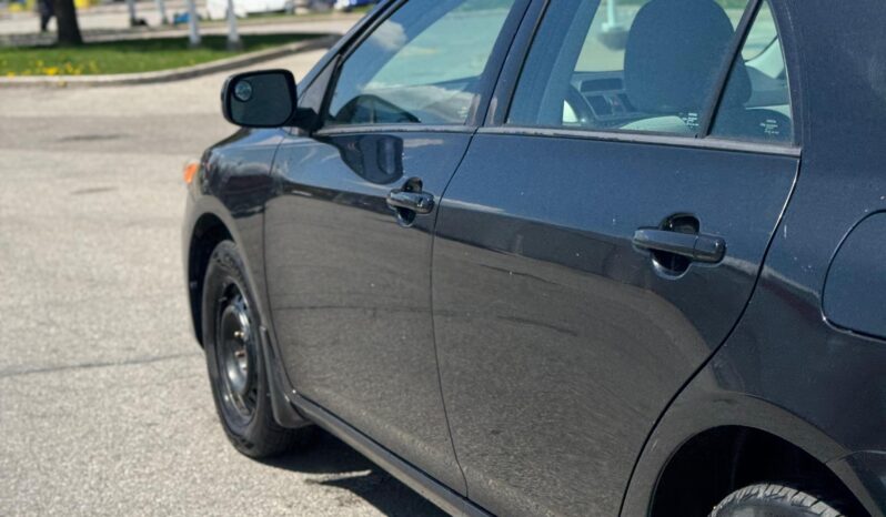 
								2013 Toyota Corolla full									